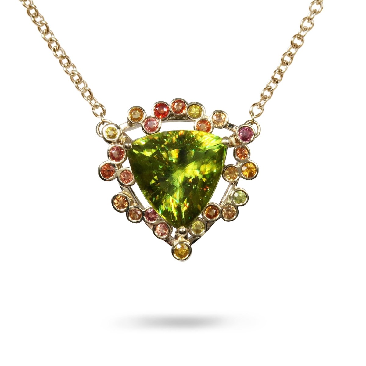 TRIGONAL SPHENE WITH YELLOW AND ORANGE SAPPHIRE IN 14K YELLOW GOLD - ALL RINGS