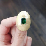 EMERALD SADDLE RING IN 18 KARAT GOLD - ALL RINGS