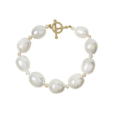 WHITE FRESHWATER PEARL BRACELET WITH 14K YELLOW GOLD ROPE TOGGLE CLASP -