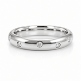 SCATTERED DIAMOND BAND IN WHITE GOLD - ALL RINGS
