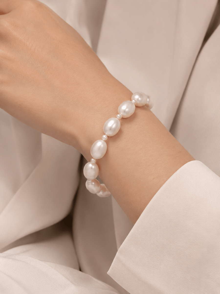 WHITE FRESHWATER PEARL BRACELET WITH 14K YELLOW GOLD ROPE TOGGLE CLASP -