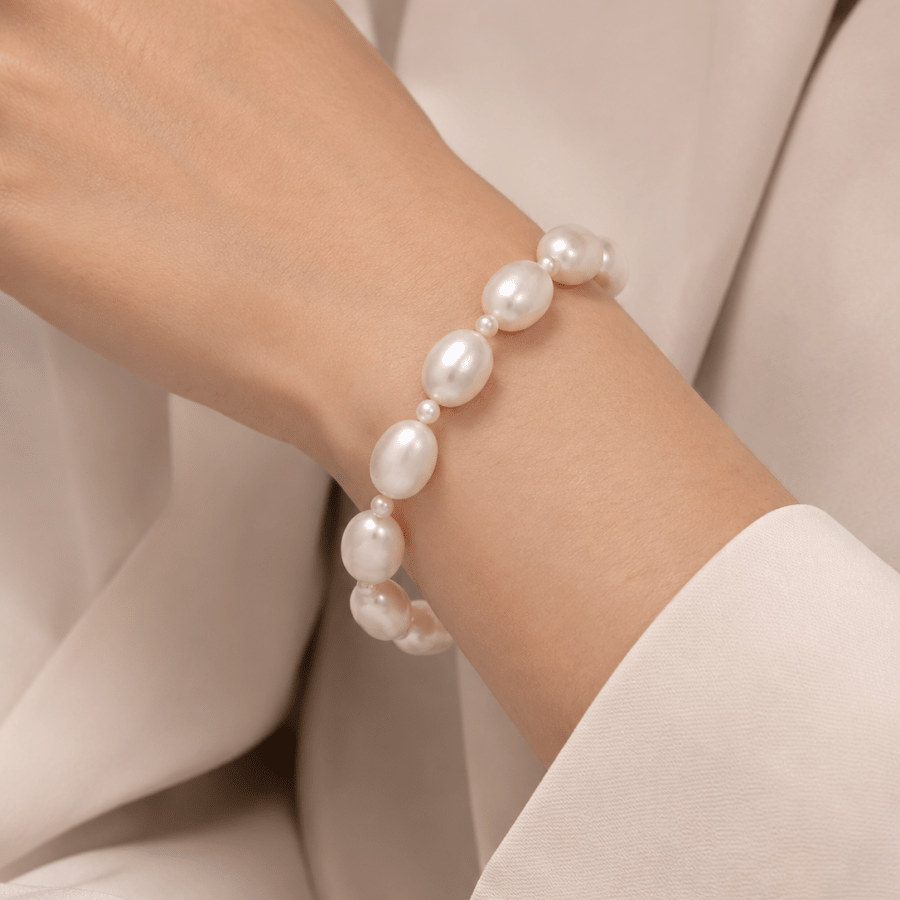 WHITE FRESHWATER PEARL BRACELET WITH 14K YELLOW GOLD ROPE TOGGLE CLASP -