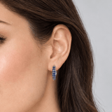 KNIFE EDGE HUGGIE EARRING IN WHITE GOLD WITH BLUE SAPPHIRE - EARRINGS