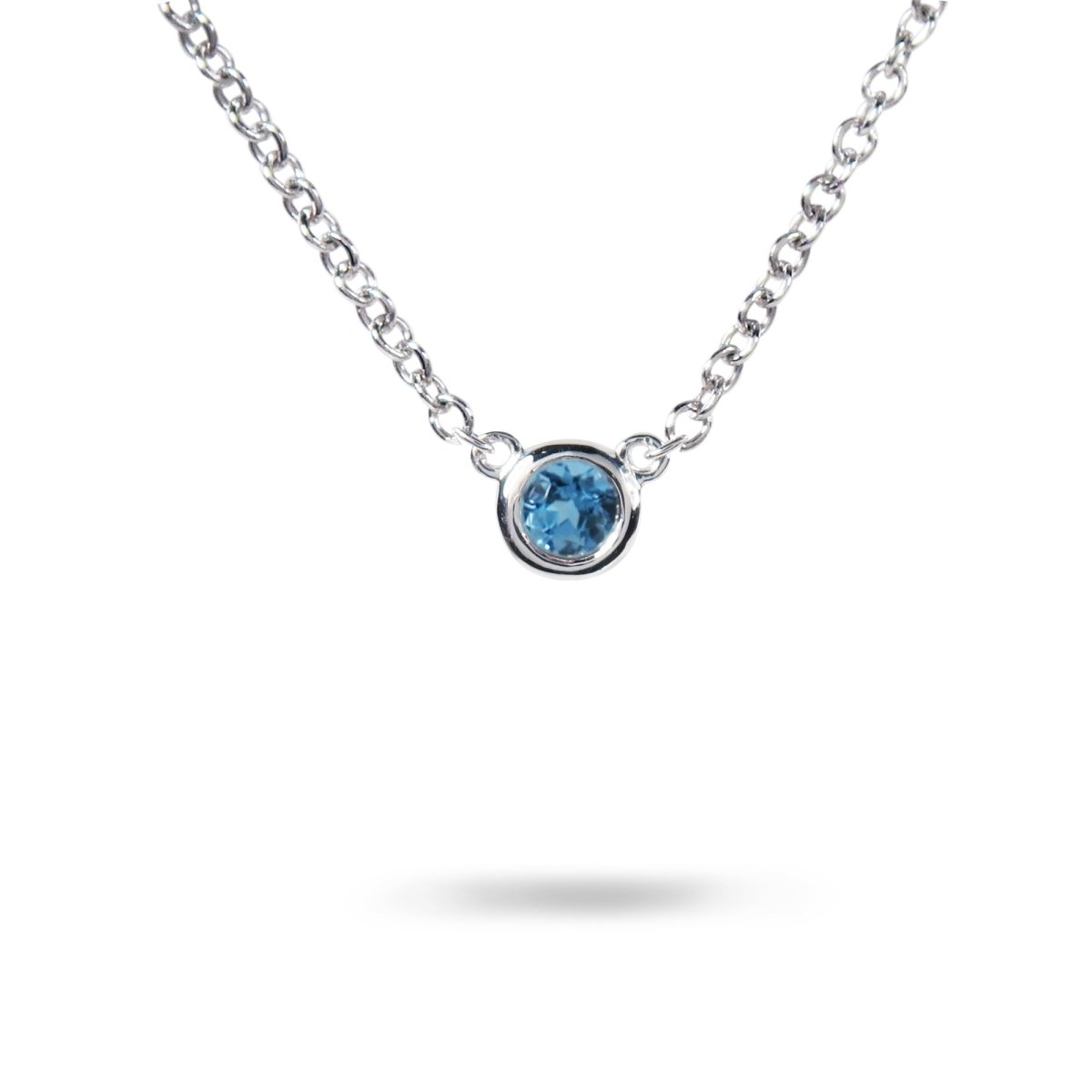 FLOATING BLUE TOPAZ IN STERLING SILVER - NECKLACES