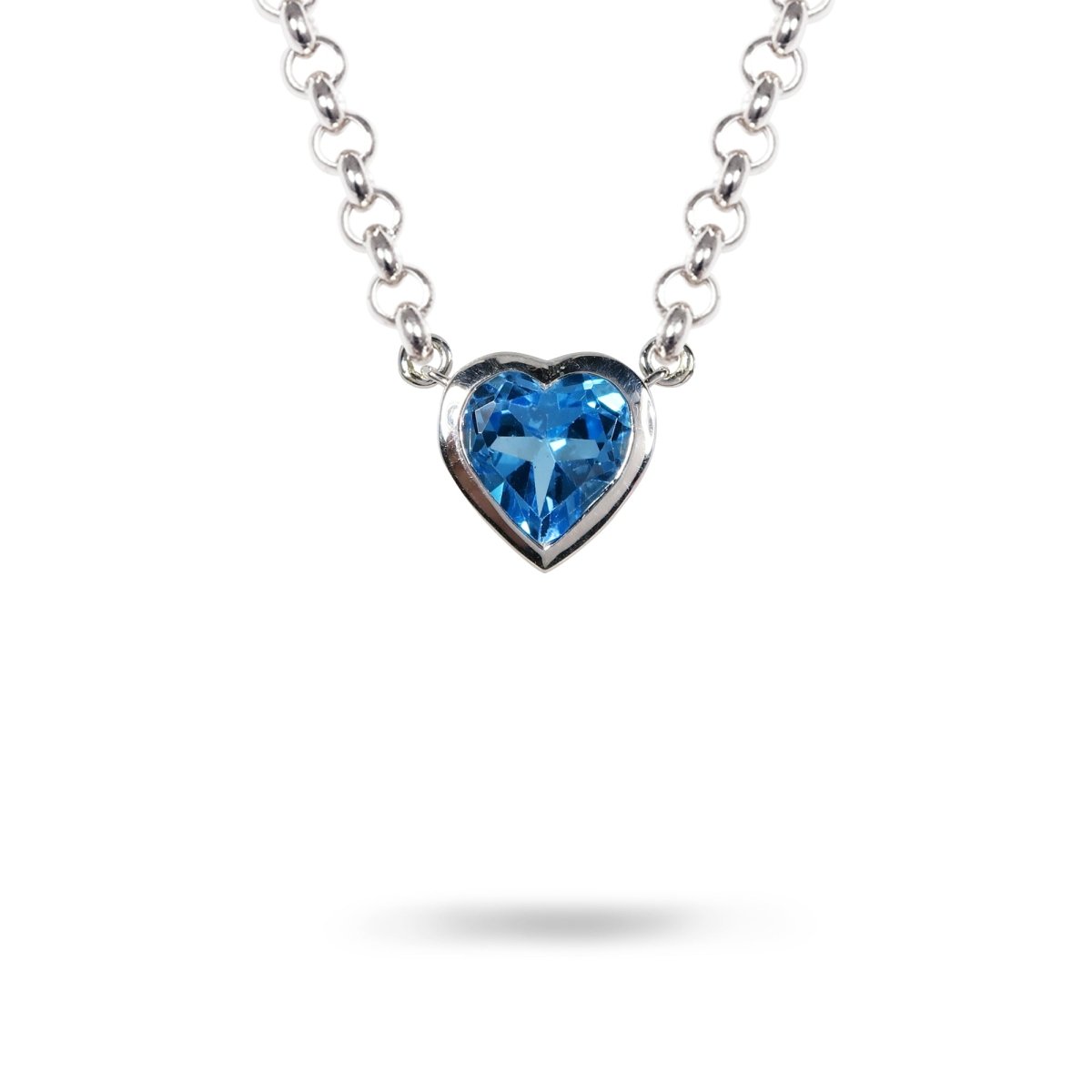 BLUE TOPAZ HEART PENDANT IN STERLING SILVER - NECKLACES