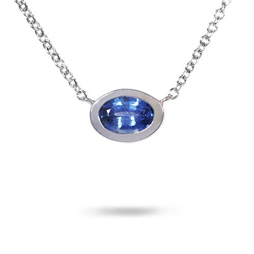 FLOATING OVAL BLUE SAPPHIRE PENDANT IN WHITE GOLD - NECKLACES
