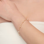 DELICATE FLOATING PEARL BRACELET - BRACELETS