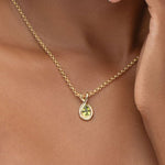 CROSS OVER PENDANT WITH PERIDOT IN 14K YELLOW GOLD - 