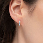 BLUE TOPAZ HUGGIE EARRINGS IN STERLING SILVER - EARRINGS