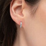 BLUE TOPAZ HUGGIE EARRINGS IN STERLING SILVER - EARRINGS