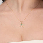 ORGANIC CIRCLE WITH EMERALD IN YELLOW GOLD - NECKLACES