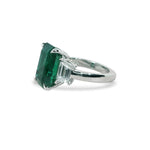 CUSTOM EMERALD & DIAMOND THREE-STONE RING IN PLATINUM -