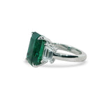 CUSTOM EMERALD & DIAMOND THREE-STONE RING IN PLATINUM -