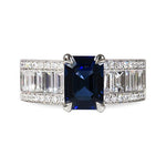 WIDE STEP CUT BLUE SAPPHIRE WITH BAGUETTE CUT DIAMOND RING - ALL RINGS