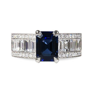 WIDE STEP CUT BLUE SAPPHIRE WITH BAGUETTE CUT DIAMOND RING - ALL RINGS