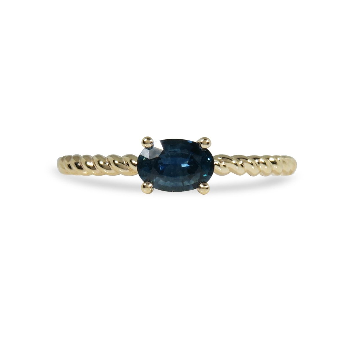 OVAL BLUE SAPPHIRE TWIST BAND IN YELLOW GOLD - 