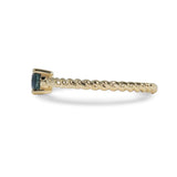 OVAL BLUE SAPPHIRE TWIST BAND IN YELLOW GOLD - 