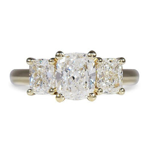 CUSHION CUT THREE DIAMONDS ENGAGEMENT RING IN YELLOW GOLD - ALL RINGS