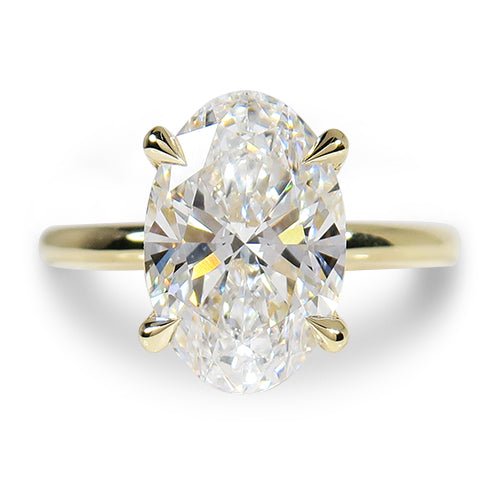 OVAL BLOSSOM ENGAGEMENT RING - ALL RINGS