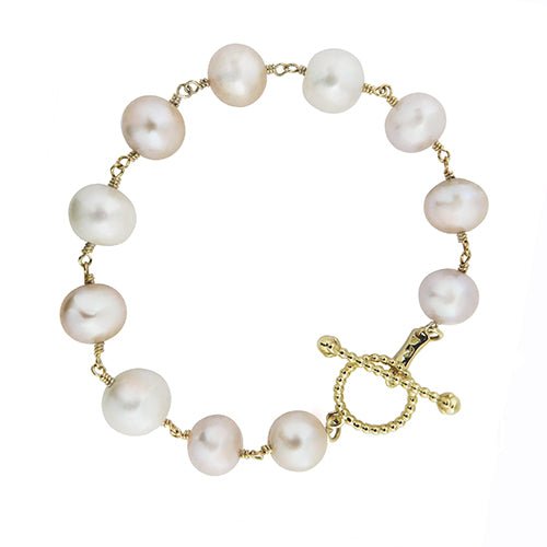 BLOSSOM TOGGLE TIED WHITE PEARL BRACELET IN YELLOW GOLD - BRACELETS