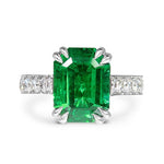 EMERALD RING WITH DOUBLE TEARDROP CLAWS -