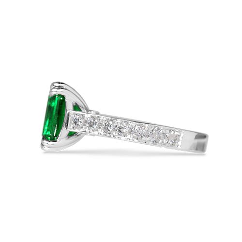 EMERALD RING WITH DOUBLE TEARDROP CLAWS -