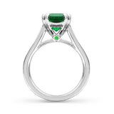 EMERALD RING WITH DOUBLE TEARDROP CLAWS -