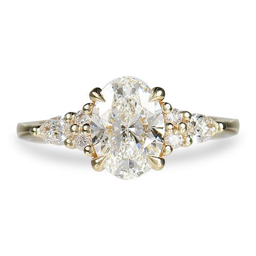 OVAL CUT DIAMOND ENGAGEMENT RING IN YELLOW GOLD - ALL RINGS