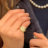 CELESTE SIGNET PINKY RING WITH DIAMONDS IN GOLD -