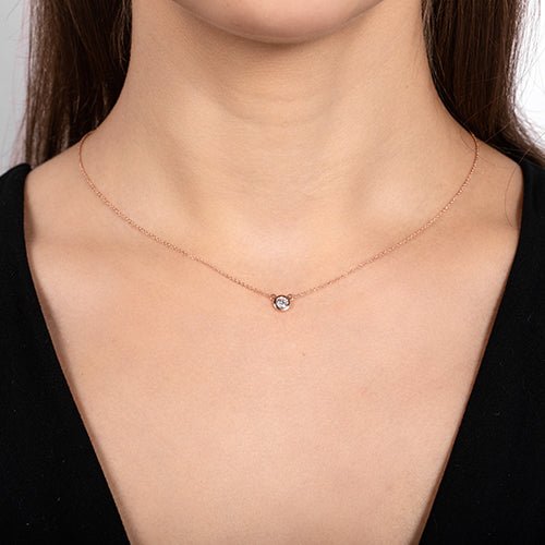 FLOATING DIAMOND PENDANT IN ROSE GOLD - NECKLACES