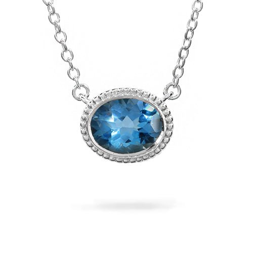 BLUE TOPAZ TESSA PENDANT IN WHITE GOLD - NECKLACES