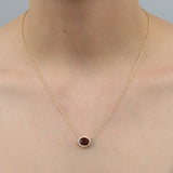 GARNET TESSA PENDANT IN YELLOW GOLD - NECKLACES