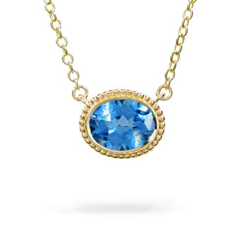 BLUE TOPAZ TESSA PENDANT IN YELLOW GOLD - NECKLACES