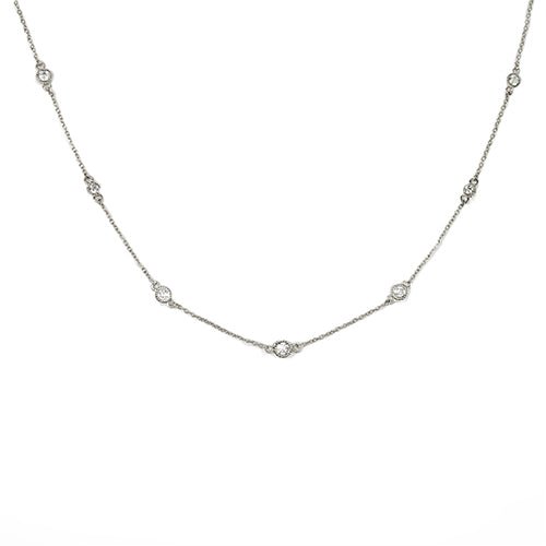 FLOATING DIAMOND NECKLACE IN WHITE GOLD WITH MILGRAIN - NECKLACES