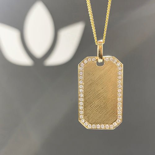 DOG TAG WITH DIAMOND PAVÉ FRAME -