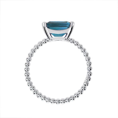 TESSA RING WITH EMERALD CUT BLUE TOPAZ IN WHITE GOLD - ANNIVERSARY & CELEBRATION RINGS
