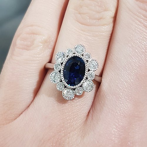 OVAL BLUE SAPPHIRE & DIAMOND RING IN PLATINUM - ALL RINGS