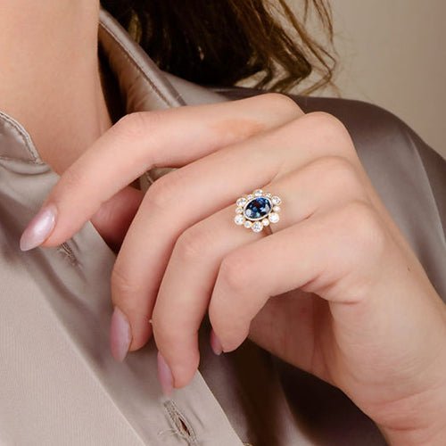 OVAL BLUE SAPPHIRE RING IN YELLOW GOLD AND PLATINUM - ALL RINGS