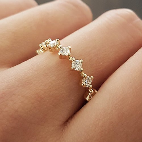 NORTH SOUTH SHARED CLAW DIAMOND BAND IN 14 KARAT GOLD - ALL RINGS