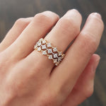 NORTH SOUTH SHARED CLAW DIAMOND BAND IN 14 KARAT GOLD - ALL RINGS