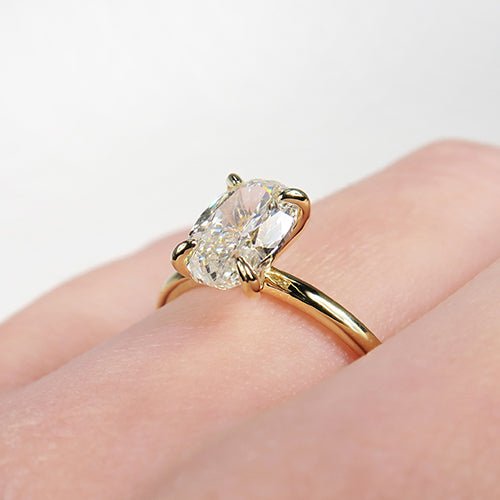 OVAL DIAMOND RING IN 18 KARAT GOLD - ALL ENGAGEMENT RINGS