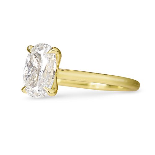 OVAL DIAMOND RING IN 18 KARAT GOLD - ALL ENGAGEMENT RINGS