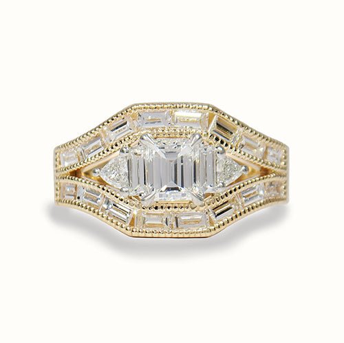 EMERALD CUT DIAMOND WITH TRILLIANTS AND BAGUETTES -