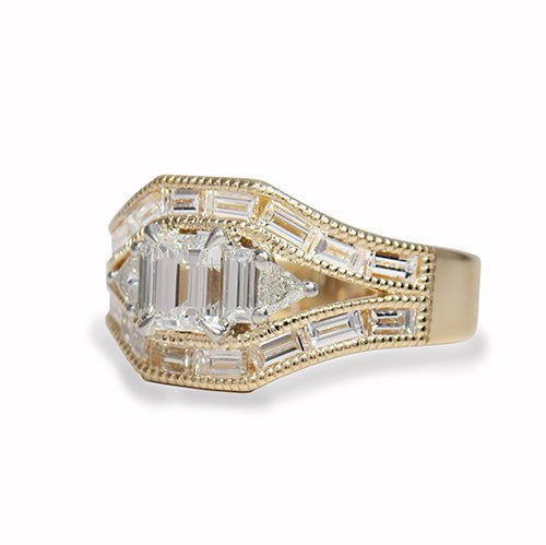 EMERALD CUT DIAMOND WITH TRILLIANTS AND BAGUETTES -