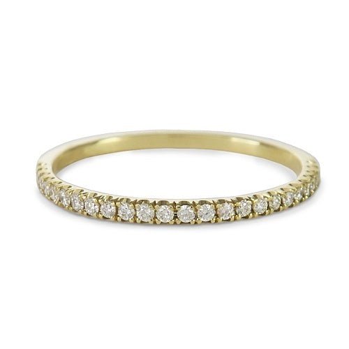 DELICATE DIAMOND WEDDING BAND WITH HALF ETERNITY IN YELLOW GOLD -