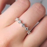 NORTH SOUTH SHARED CLAW DIAMOND BAND IN 14 KARAT GOLD - ALL RINGS