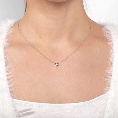FLOATING DIAMOND PENDANT IN WHITE GOLD - NECKLACES